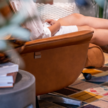 Load image into Gallery viewer, Viva lounge chair was created with ergonomic comfort and sustainability at its core. The purity and precision of the design are amplified by each of the different leather finishings; full vivid leathers or traditional colors with a firm seat; in white self-skinning cold cure polyurethane. For such a bold, eye-catching design sofa, Viva recliner chair is a remarkably versatile item. – a timeless form designed for superlative comfort.