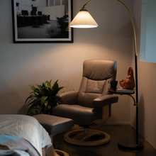 Load image into Gallery viewer, This recliner boasts a luxuriously comfortable seat and back cushion, complemented by its rounded backrest which adapts to your body to ensure exceptional support. Boasting a sleek design and slim fit, this ergonomic leather lounge chair is ideal for bedrooms, living rooms, and all other interior spaces. Bergen lounge chair is designed with 360-degree swivel function and matching footstool, with a selection of four genuine bovine leather colors available for you to choose from.